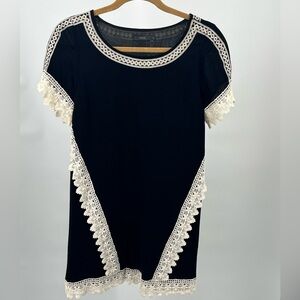 THML women's straight line dress. Black with cream lace capped sleeves. Size S